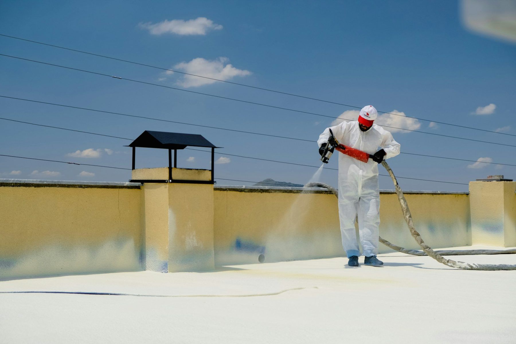 Spray-applied waterproofing membrane on a flat roof in the UAE